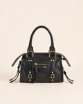 Sac à main noir verni – Élégance intemporelle